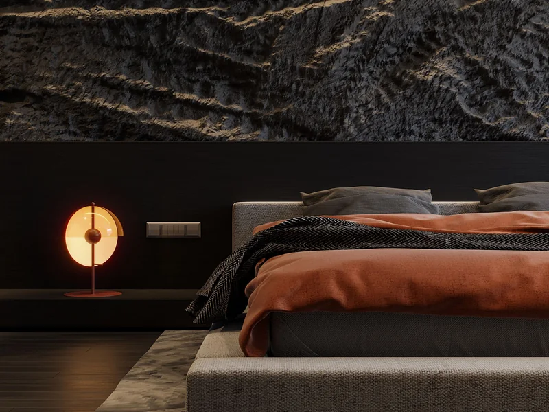 Chambre contemporaine éclairée par une lumière douce et rasante